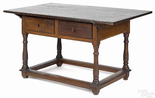 Pennsylvania pine and walnut tavern table, 18th c., 29'' h., 52'' w., 31'' d.