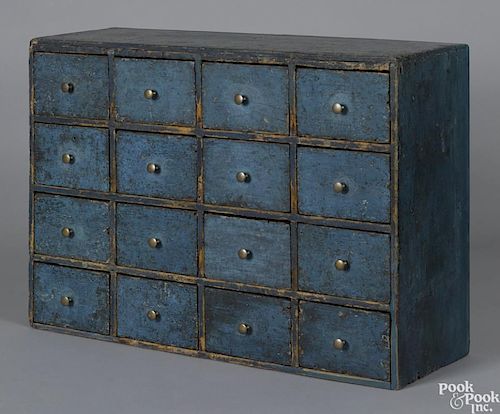 Pennsylvania painted poplar apothecary cupboard, 19th c., retaining an old scrubbed blue surface