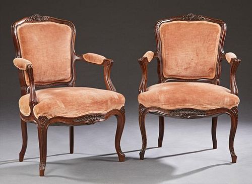 Pair of Louis XV Style Carved Walnut Fauteuils, ea