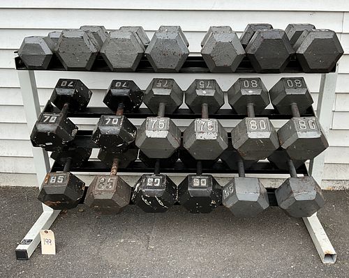20 PC WEIGHT RACK AND LARGE IRON DUMBBELL WEIGHTS.