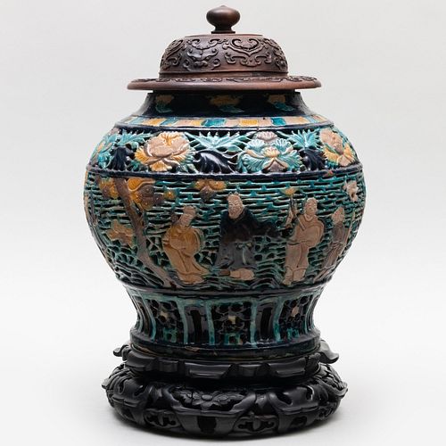 Chinese Fahua Reticulated Pottery 'Eight Immortals' Jar and a Wood Cover