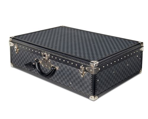 A vintage Louis Vuitton Alzer 75 Damier suitcase