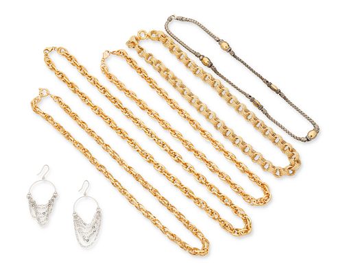 A group of gold and silver necklaces