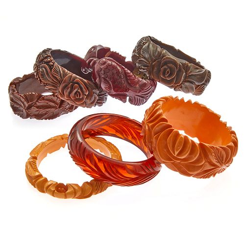 Collection of Seven Carved Bakelite Bangle Bracelets