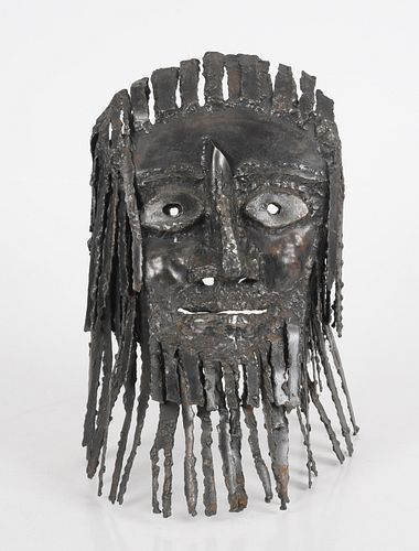 A Steel Brutalist Mask Sculpture