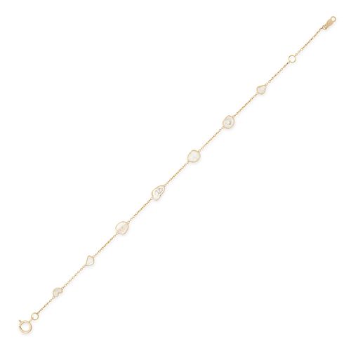 A DIAMOND BRACELET in 18ct yellow gold, set with seven slices of rough diamond, stamped 750, 19.0...