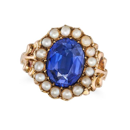 A SYNTHETIC SAPPHIRE AND SEED PEARL CLUSTER RING in yellow gold, set with an oval cut synthetic s...