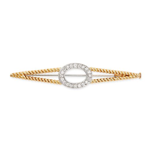A DIAMOND BROOCH in 18ct white and yellow gold, comprising an oval motif set with round brilliant...