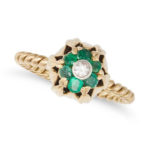 AN EMERALD AND DIAMOND FLOWER RING in 18ct yellow and white gold, designed as a flower bud set wi...