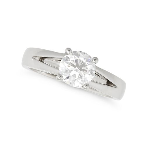 A SOLITAIRE DIAMOND RING in platinum, set with a round brilliant cut diamond of 0.90 carats, full...