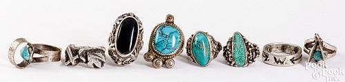 Eight Navajo Indian silver and turquoise rings
