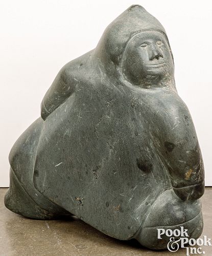 Large Eskimo carved stone figure of a man