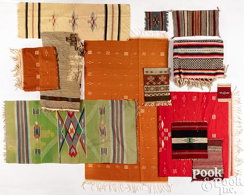 Large group of tribal textiles and rugs