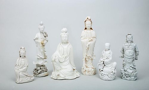 Five Chinese Blanc de Chine Porcelain Figures of Kwan Yin and a Figure of a War Lord