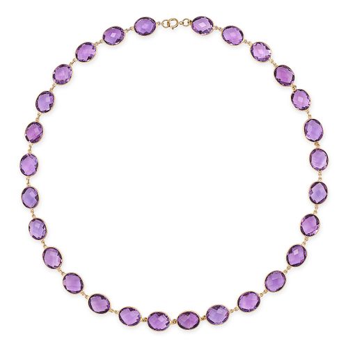 AN AMETHYST RIVIERE NECKLACE in 18ct yellow gold, set with a row of faceted oval cut amethysts, s...