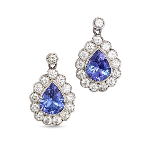 A PAIR OF TANZANITE AND DIAMOND CLUSTER EARRINGS in 18ct white gold, each set with pear cut tanza...