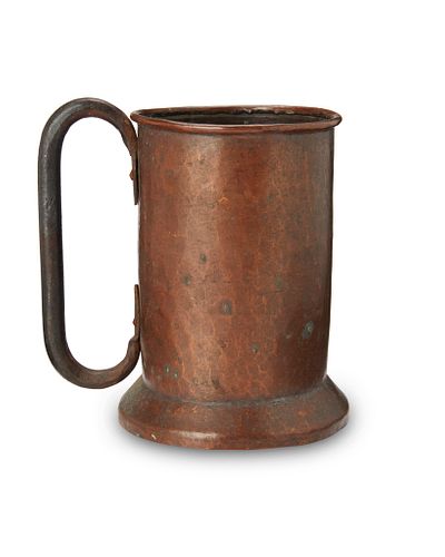 A Stickley Brothers hammered copper tankard no. 45