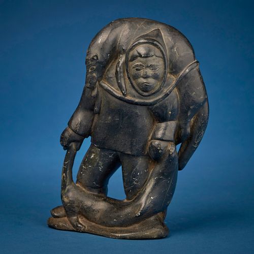 An Inuit carved stone figure, Early/mid-20th century