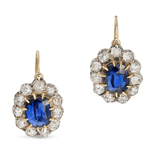 A PAIR OF ANTIQUE SAPPHIRE AND DIAMOND CLUSTER EARRINGS in yellow gold and silver, each set with ...
