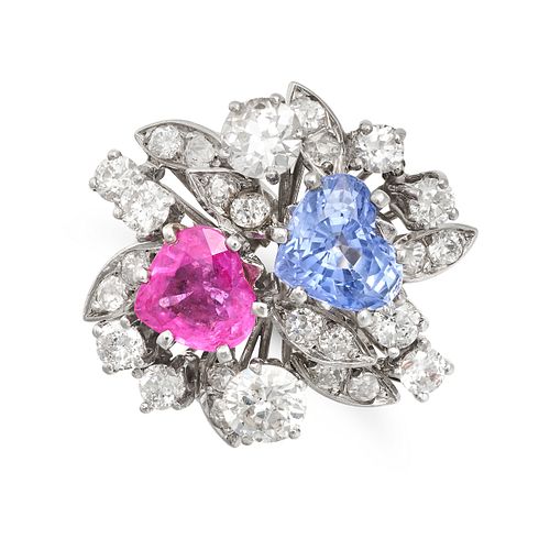 A SAPPHIRE, PINK SAPPHIRE AND DIAMOND CLUSTER RING in 18ct white gold, set with a heart shaped bl...