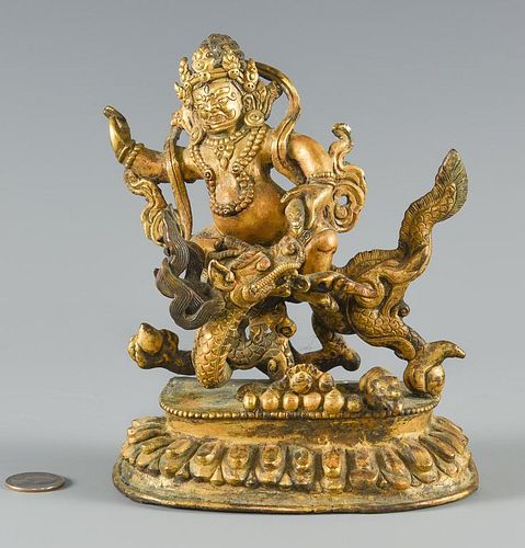 Gilt bronze figure on dragon