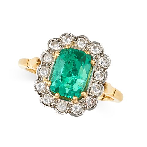 A COLOMBIAN EMERALD AND DIAMOND CLUSTER RING in 18ct yellow and white gold, set with an octagonal...