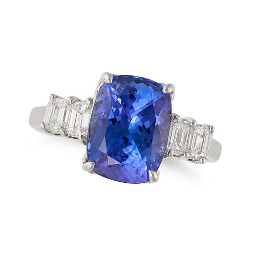 A TANZANITE AND DIAMOND RING in 18ct white gold, set with a cushion cut tanzanite of 3.89 carats ...