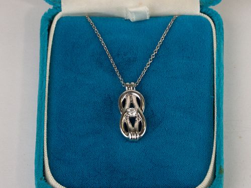Diamond Sterling Silver Love Knot Necklace~ .25CT SI1