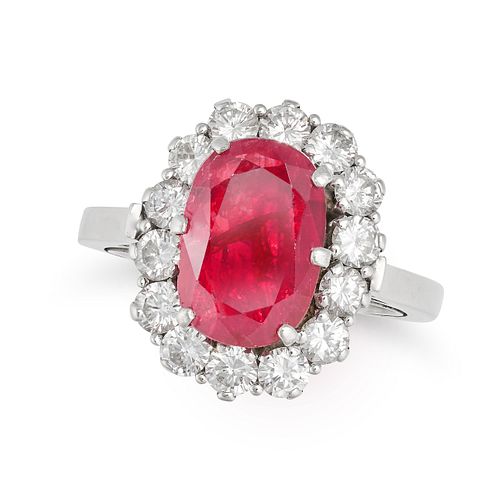 A BURMA NO HEAT RUBY AND DIAMOND CLUSTER RING in 18ct white gold, set with a cushion cut ruby of ...