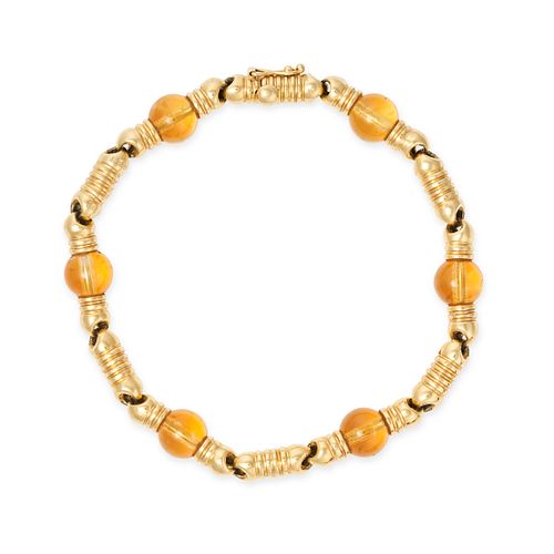 BOUCHERON, A VINTAGE CITRINE BRACELET in 18ct yellow gold, comprising a row of stylised gold link...