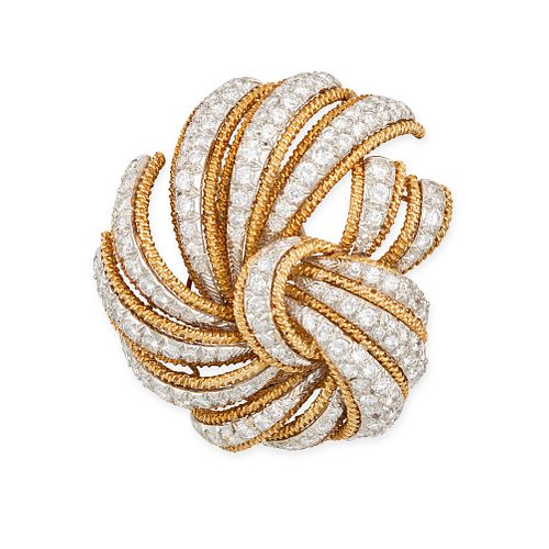 DAVID WEBB, A VINTAGE DIAMOND BROOCH in 18ct yellow gold and platinum, the scrolling body pave se...