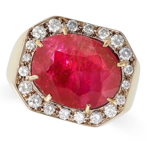 A 9.96 CARAT BURMA NO HEAT RUBY AND DIAMOND RING in yellow gold, set with an oval cut ruby of 9.9...
