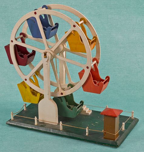 Painted wood Ferris wheel with a crank handle and