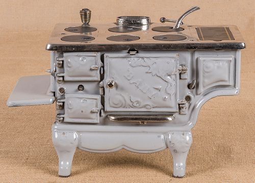 Cast iron, nickel, and enameled Baby toy stove,