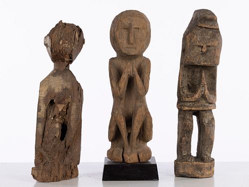 Three Carved Wood Seated Figures, African