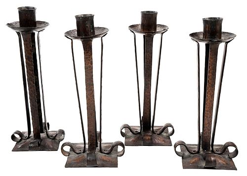 Four Arts and Crafts Hand Wrought Copper Candlesticks