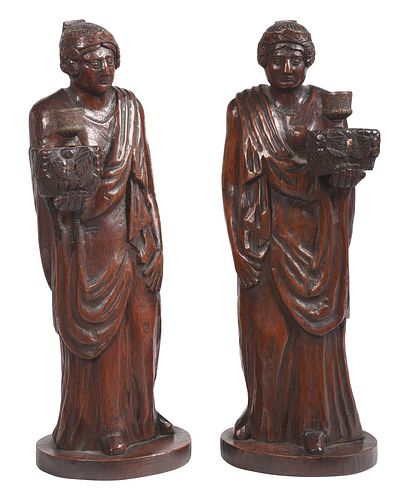 Two Carved Wooden Figural Candle Holders