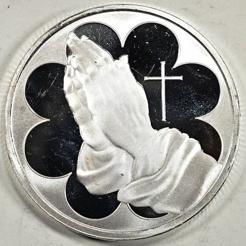 ONE OZ .999 PRAYING HANDS  SILVER ROUNDS
