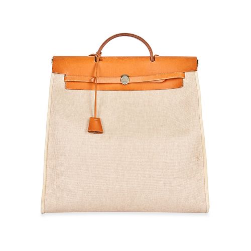 HERMES CONVERTIBLE HERBAG CANVAS BAG Condition grade C+. Produced in 1999. 40cm long, 45cm high...