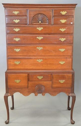 Queen Anne cherry highboy in two parts, 18th century top with lower section made to match. ht. 65in., wd. 38in., dp. 19in.