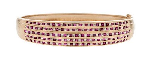 Diamond and Ruby Bangle Bracelet in 18 Karat Yellow Gold 