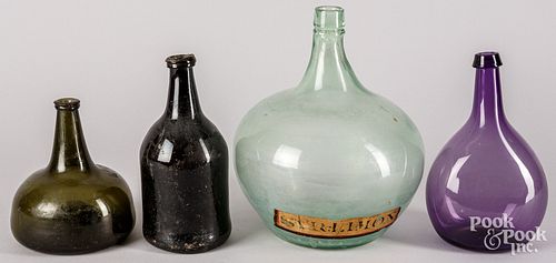 Four glass bottles