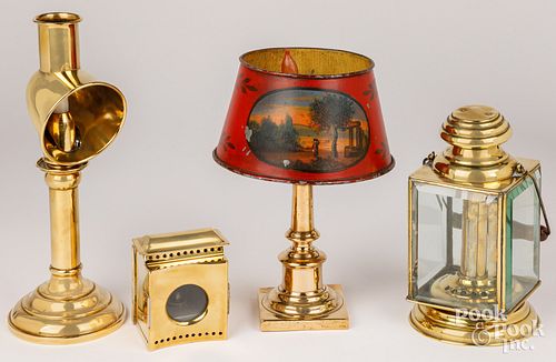 Four brass lamps and lanterns