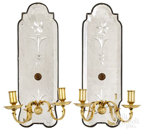 Pair of mirrored brass sconces