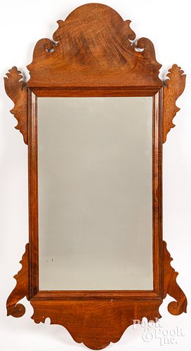 Bench made Chippendale style walnut mirror