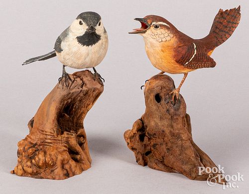 Two carved and painted songbirds