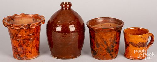 Four pieces of Pennsylvania redware, 19th c.