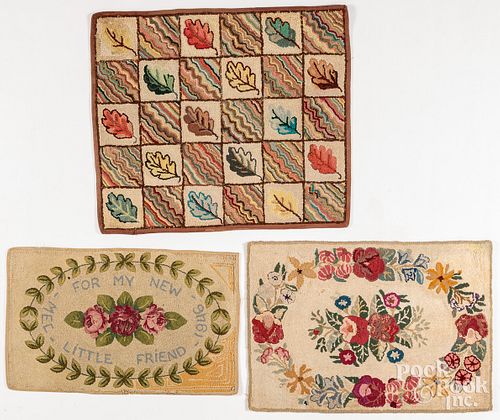 Three floral hooked rugs, mid 20th c.