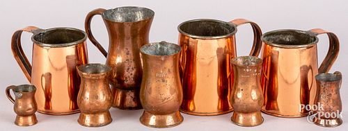 Copper mugs and measures