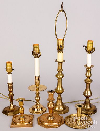Brass candlesticks and table lamps